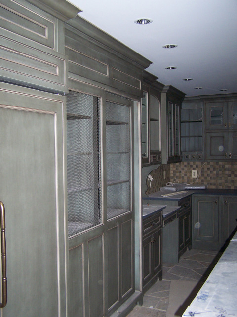 Custom Cabinetry and Crown Mould Installed by OzCorp Craftsman