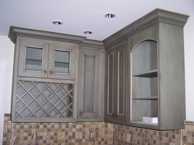 Custom Cabinetry and Crown Mould Installed by OzCorp Craftsman